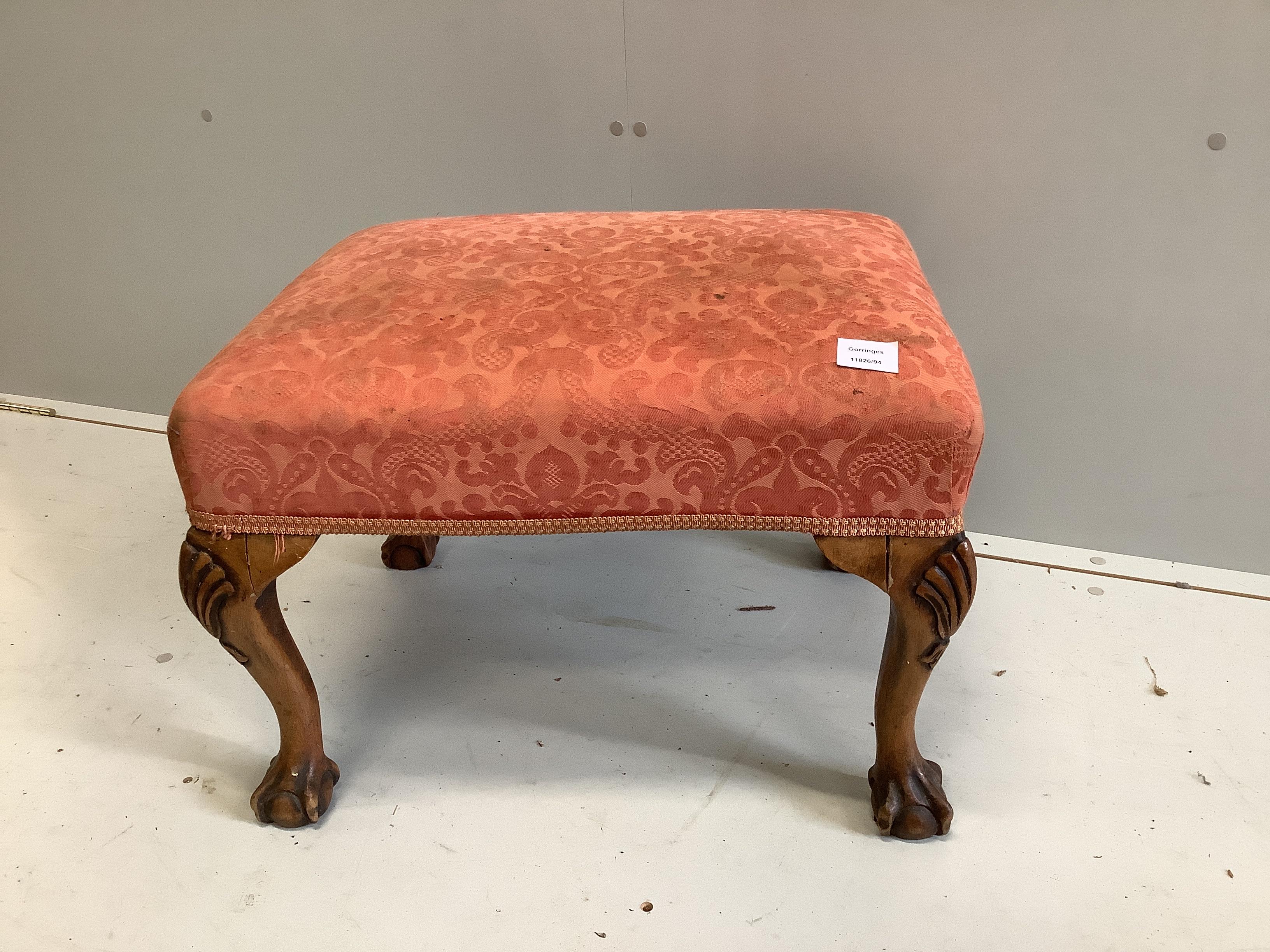 A Queen Anne revival carved walnut dressing stool, width 59cm, depth 47cm, height 40cm